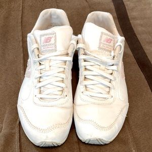 Gently worn New Balance sneakers.